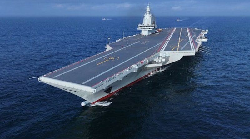 Undated aerial drone photo shows China's third aircraft carrier Fujian during its maiden sea trial. Photo Credit: China Military Online