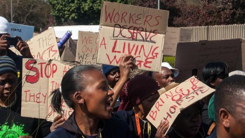 University of Johannesburg cleaners and other organizations supporting the Persistent Solidarity Forum march in demand of a fair living wage for the workers. CREDIT: "Protesters: 'Workers deserve a living wage'" by Meraj Chhaya