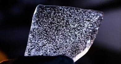 A slice from an Antarctic ice core. Researchers study the chemicals trapped in old ice to learn about past climate. CREDIT: Photo by Katherine Stelling, Oregon State University.