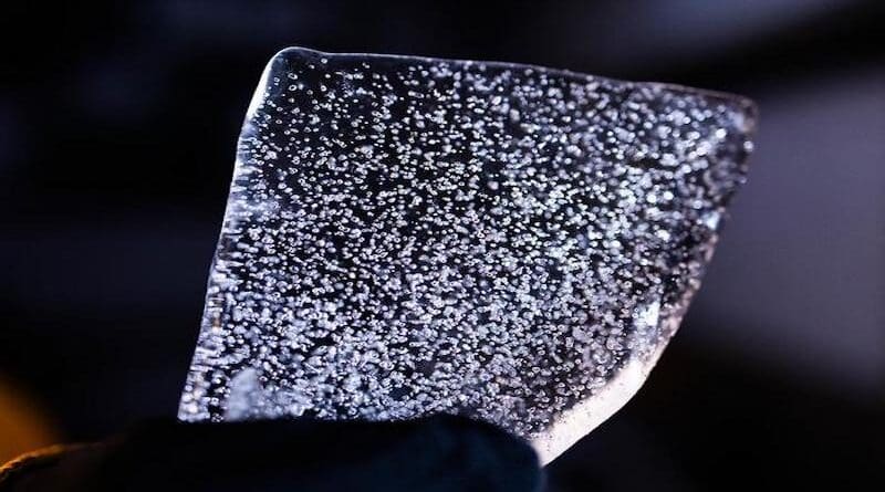 A slice from an Antarctic ice core. Researchers study the chemicals trapped in old ice to learn about past climate. CREDIT: Photo by Katherine Stelling, Oregon State University.