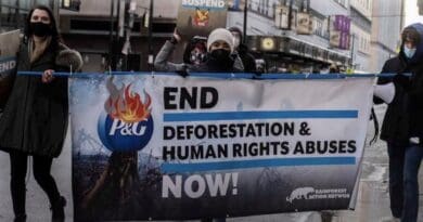 Activists protest P&G's role in deforestation and human rights abuses. (Photo credit: Rainforest Action Network)