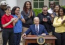 President Joe Biden signs a document in the Rose Garden of the White House in Washington, Tuesday, May 14, 2024, imposing major new tariffs on electric vehicles, semiconductors, solar equipment and medical supplies imported from China. Photo Credit: POTUS, X