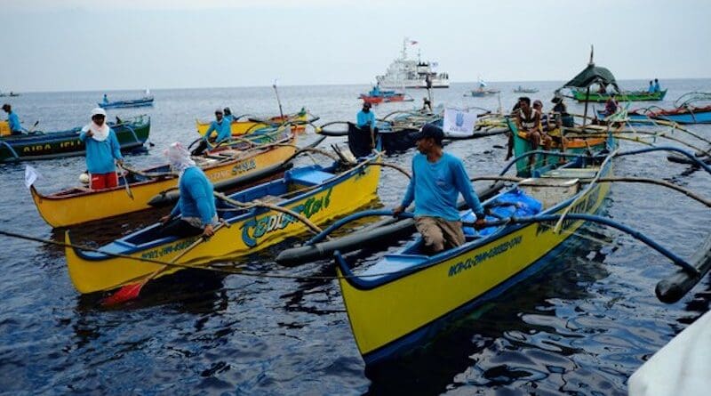 Filipino fishermen aboard small wooden boats join the first part of the civilian convoy from Masinloc port in Zambales province, Philippines, May 15, 2024. Photo Credit: Jojo Riñoza/BenarNews