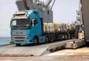 A truck carrying humanitarian aid moves off the causeway in Gaza. Photo Credit: U.S. Central Command