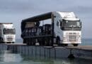 Trucks delivering humanitarian aid to Gaza cross temporary pier. Photo Credit: CENTCOM