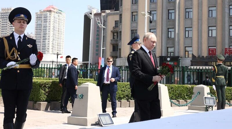 Russia's President Vladimir Putin laid flowers at the Monument to Soviet Red Army Soldiers who perished while liberating Northeast China. Photo Credit: Kremlin.ru