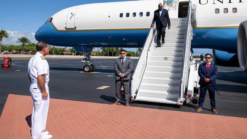 Secretary of Defense Lloyd J. Austin III is greeted by Navy Adm. John Aquilino, 26th Commander of U.S. Indo-Pacific Command, upon arrival to Joint Base Pearl Harbor-Hickam, Hawaii, for the Indo-Pacom change of command ceremony. Photo Credit: Air Force Tech. Sgt. Jack Sanders