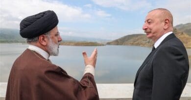 Iran's President Ebrahim Raisi with Azerbaijan's President Ilham Aliyev on May 19 after inaugurating a dam built jointly by the two countries on the Aras River. Photo Credit: Tasnim News Agency
