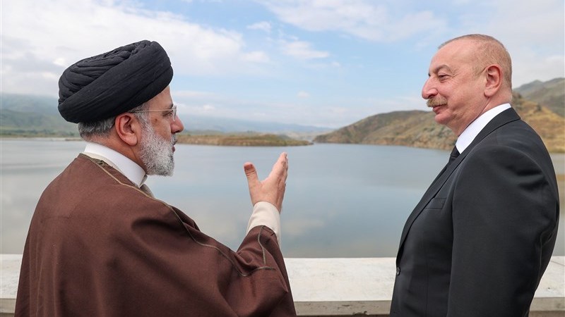 Iran's President Ebrahim Raisi with Azerbaijan's President Ilham Aliyev on May 19 after inaugurating a dam built jointly by the two countries on the Aras River. Photo Credit: Tasnim News Agency