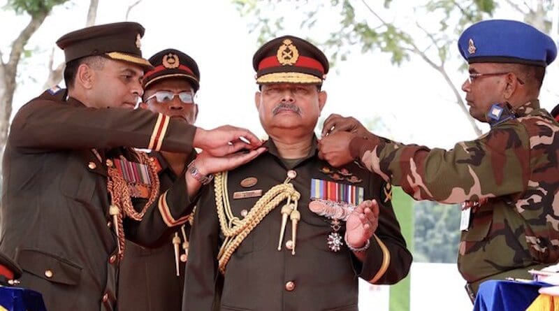Gen. Aziz Ahmed (center) receives a badge naming him the ‘7th Colonel Commandant’ of the Corps of Engineers at the Engineer Center and School of Military Engineering in Natore, a district in the city of Rajshahi, Bangladesh, Oct. 28, 2019. Photo Credit: Courtesy Inter-Services Public Relations