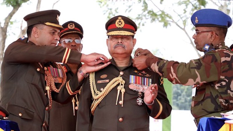 Gen. Aziz Ahmed (center) receives a badge naming him the ‘7th Colonel Commandant’ of the Corps of Engineers at the Engineer Center and School of Military Engineering in Natore, a district in the city of Rajshahi, Bangladesh, Oct. 28, 2019. Photo Credit: Courtesy Inter-Services Public Relations