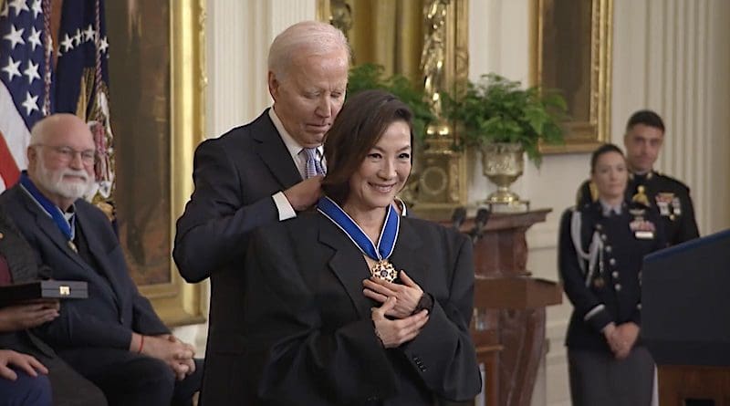 U.S. President Joe Biden awards the nation’s highest civilian honor, the Presidential Medal of Freedom, to Malaysia-born actress Michelle Yeoh. Photo Credit: White House video screenshot