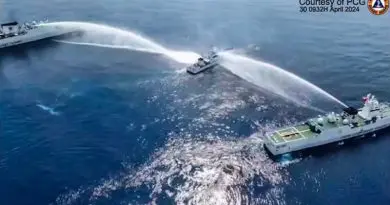The BRP Bagacay (center), a Philippine Coast Guard ship, is hit by water cannon fired by Chinese coast guard ships near Scarborough Shoal in the South China Sea, in this frame grab from a handout video filmed and released April 30, 2024. [Handout/Philippine Coast Guard]