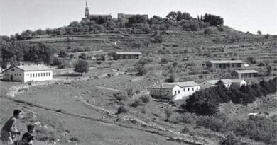 Kiryat Ye'arim in 1937 in the Jerusalem District of Israel with the Church of Our Lady of the Ark of the Covenant on the hill behind. Photo by Abraham Malevsky, Wikipedia Commons