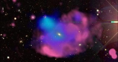 This multiwavelength image of the Cloverleaf ORC (odd radio circle) combines visible light observations from the DESI (Dark Energy Spectroscopic Instrument) Legacy Survey in white and yellow, X-rays from XMM-Newton in blue, and radio from ASKAP (the Australian Square Kilometer Array Pathfinder) in red. CREDIT: X. Zhang and M. Kluge (MPE), B. Koribalski (CSIRO)