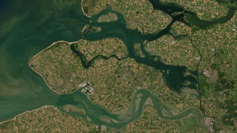 Satellite view of Zeeland, the Netherlands, featuring the Oosterschelde and Westerschelde, where clear water highlights the need for increased turbidity for coastal protection. Credit: basemaps, Esri, Maxar, Earthstar Geographics, and the GIS User Community