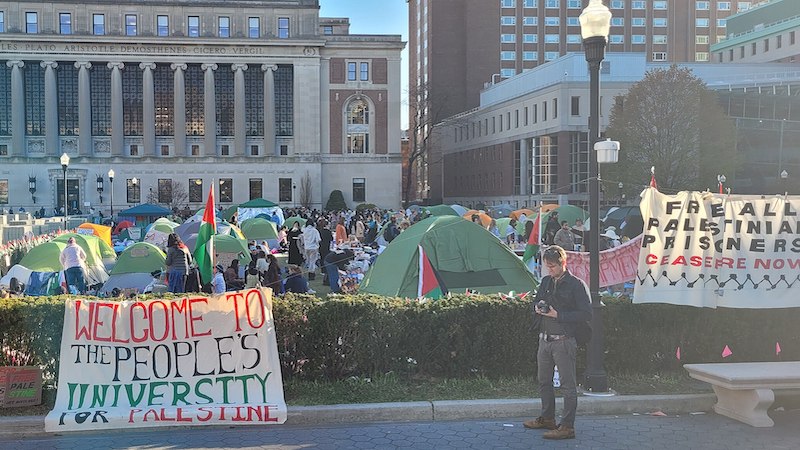 Signs at Columbia University, including one stating: "Welcome to the People's University for Palestine". Photo Credit: عباد ديرانية, Wikipedia Commons
