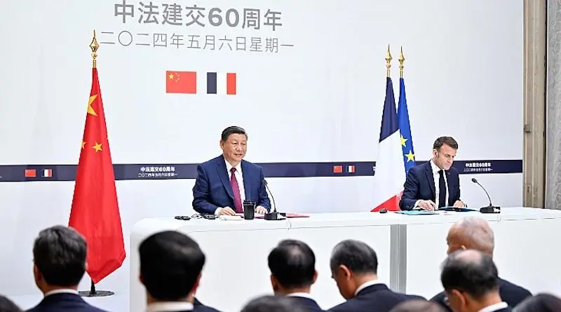 China's President Xi Jinping with France's President Emmanuel Macron. Photo Credit: China Xinhua News/X