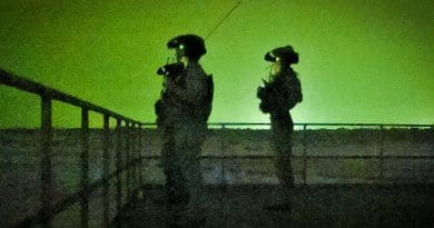 Air Force Special Tactics operators observe the range before conducting close air support training during Emerald Warrior 23 at Eglin Range, Fla. Photo Credit: Air Force Staff Sgt. Jerreht Harris, DOD