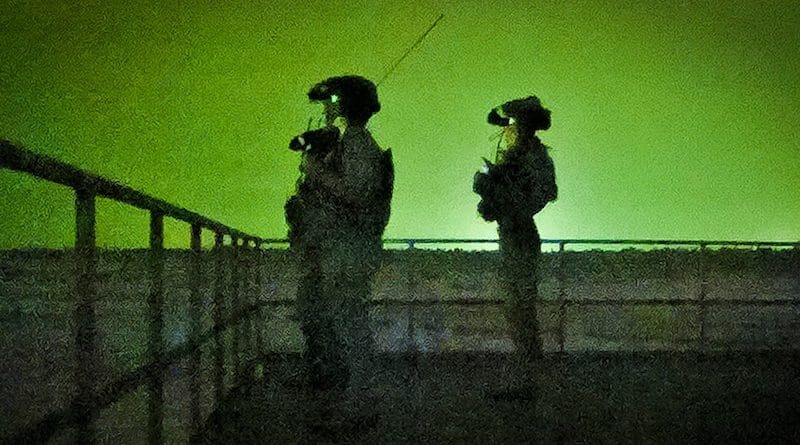 Air Force Special Tactics operators observe the range before conducting close air support training during Emerald Warrior 23 at Eglin Range, Fla. Photo Credit: Air Force Staff Sgt. Jerreht Harris, DOD