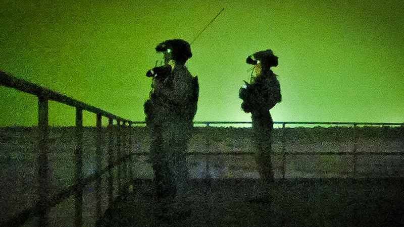 Air Force Special Tactics operators observe the range before conducting close air support training during Emerald Warrior 23 at Eglin Range, Fla. Photo Credit: Air Force Staff Sgt. Jerreht Harris, DOD