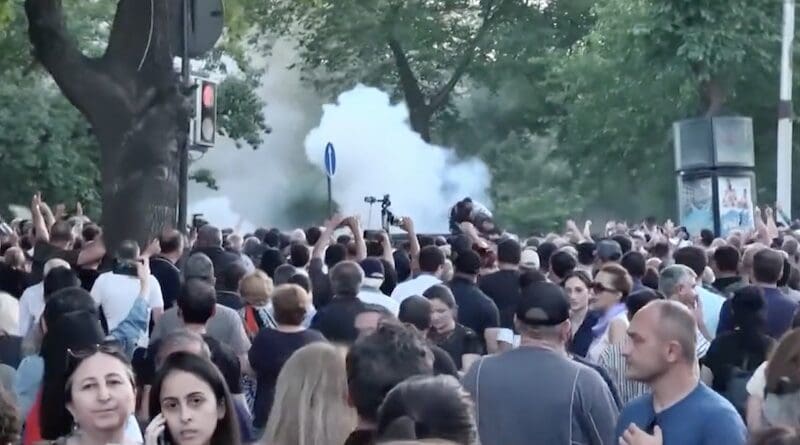 Police in Armenia use stun grenades on protestors. Photo Credit: RFE/RL video screenshot