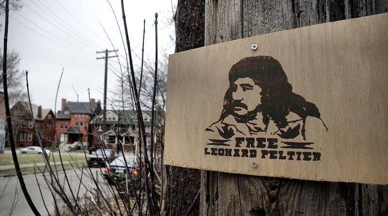 A free Leonard Peltier sign. Photo Credit: KARPOV THE WRECKED TRAIN, Wikimedia Commons