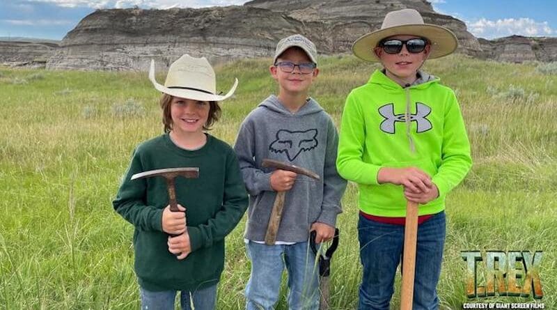 (L-R): Liam Fisher, Kaiden Madsen and Jessin Fisher, then 7, 9 and 10, made the discovery of a lifetime near their North Dakota home in 2022: the remains of a rare teenage Tyrannosaurus rex that could rewrite history. An award-winning Giant Screen Films documentary crew, renowned palaeontologists led by Dr. Tyler Lyson of the Denver Museum of Nature & Science, several of the world’s foremost natural history museums, and top animators have partnered to present the kids’ discovery in dramatic cinematic fashion. Debuting June 21, T.REX will roar in 100 museum theatres worldwide. CREDIT: Giant Screen Films