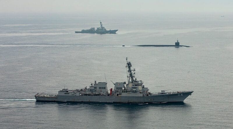 Ohio-class ballistic-missile submarine USS Kentucky proceeds on the surface to Busan for a port visit while escorted by Arleigh Burke-class guided-missile destroyers USS John Finn and USS Ralph Johnson. Photo Credit: Navy Petty Officer 2nd Class Samantha Oblander