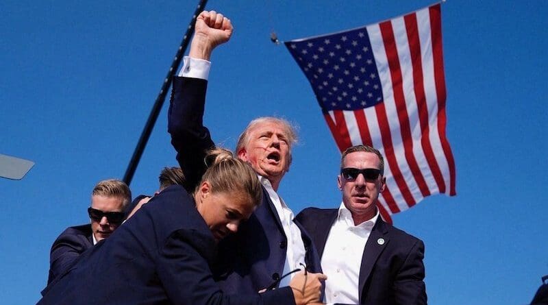 Republican presidential candidate and former President Donald Trump being rushed off the stage at a campaign event in Butler, Pennsylvania, July 13, 2024. Photo Credit: Donald Trump Jr., X
