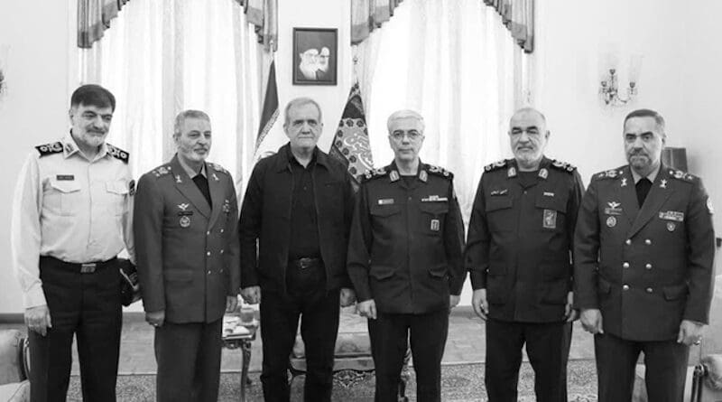Iran's Massoud Pezeshkian (middle) standing with key IRGC figures. Photo Credit: PMOI