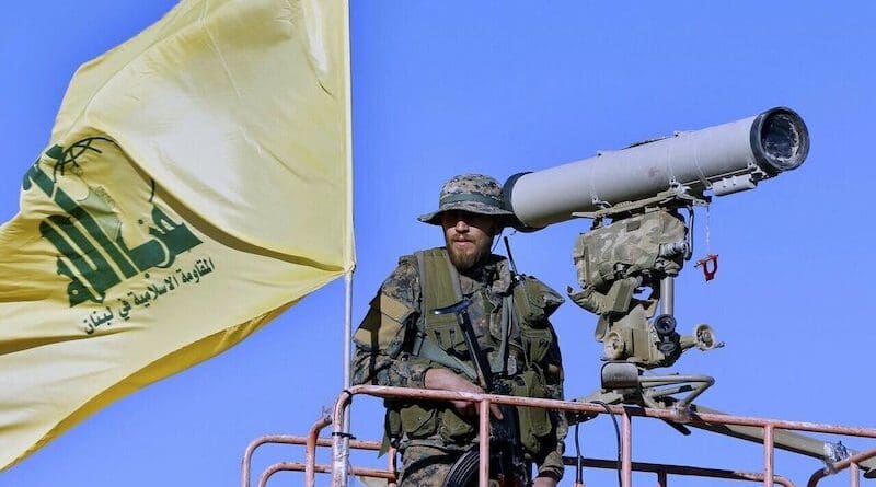 A member of Hezbollah mans a rocket launcher. Photo Credit: Hezbollah video screenshot