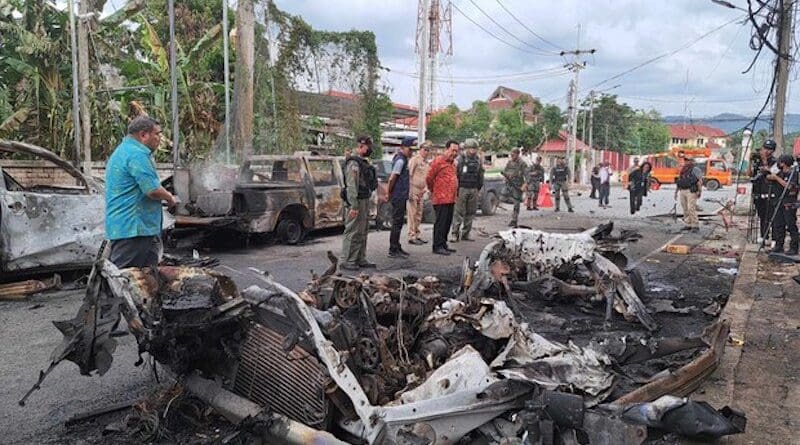 Thai Justice Minister Tawee Sodsong (in red shirt) visits the site of car-bombing in front of a police residence building in Bannang Sata, district of southern Thailand’s Yala province, June 30, 2024. Photo Credit: Handout/Bannang Sata Police Station