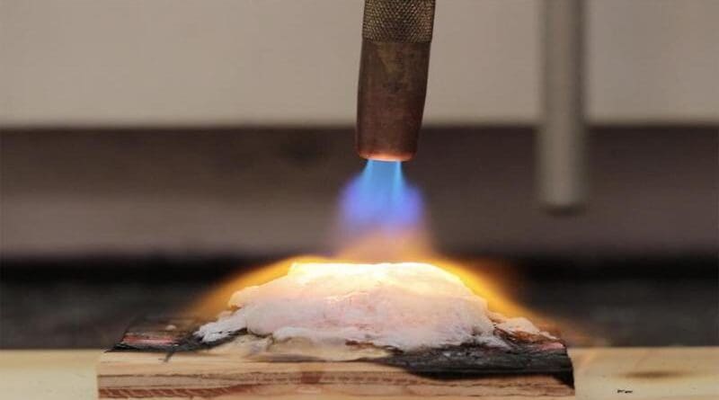 During a test on plywood, researchers showed how the new gel transitions from a hydrogel to an aerogel under heat from a gas hand-torch. The torch burned at a much higher temperature than would result from a wildfire. | Andrea d’Aquino