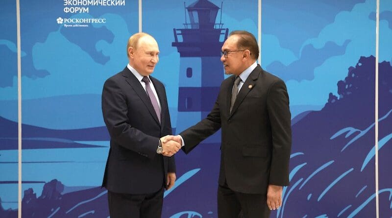 Russia's President Vladimir Putin with Prime Minister of Malaysia Anwar Ibrahim. Photo Credit: Kremlin.ru