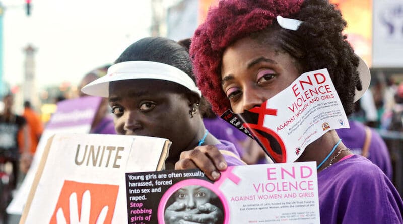 Jamaican protesters demand elimination of violence against women. Researchers say the economic impact of climate-related disasters can fuel violence as much as two years later. Copyright: Khristina Godfrey / UN Women. (CC BY-NC-ND 2.0)