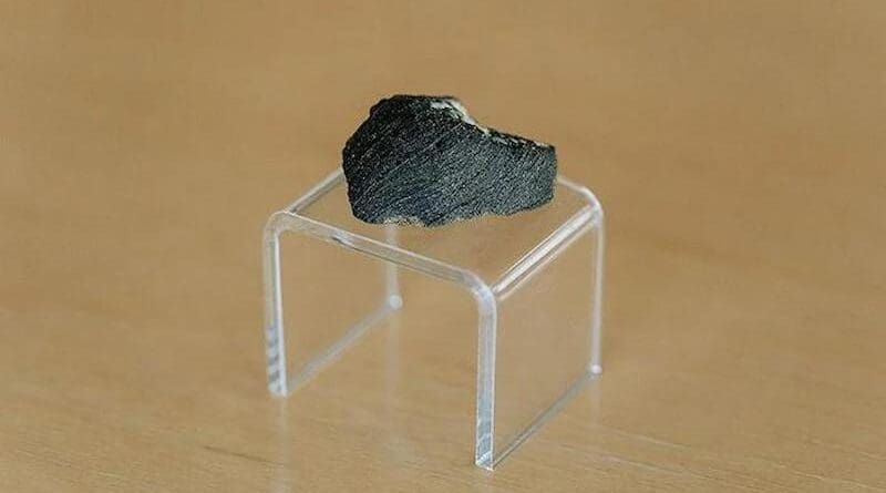 An asteroid struck Mars 11 million years ago and sent pieces of the red planet hurtling through space. One of these chunks of Mars eventually crashed into the Earth somewhere near Purdue and is one of the few meteorites that can be traced directly to Mars. This meteorite was rediscovered in a drawer at Purdue University in 1931 and therefore named the Lafayette Meteorite. Credit: Purdue University
