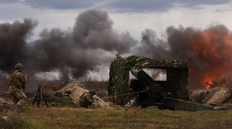 Ukrainian soldiers firing on Russian positions. Photo Credit: Ukraine Defense Ministry