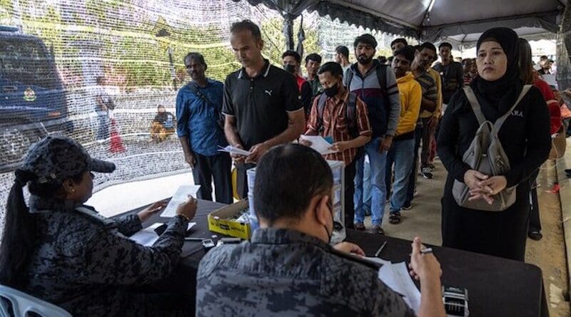 Malaysian officials register foreigners seeking to leave the country before the Migrant Repatriation Program expires on Dec. 31 at the Immigration Department office in Kuala Lumpur, Dec. 11, 2024. Photo Credit: S. Mahfuz/BenarNews