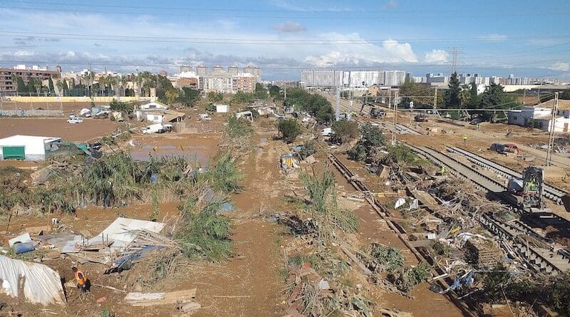 Aftermath of the 'DANA' flash floods at Sedaví, Horta Sud, Spain with many wooden structures destroyed, numerous trees downed, and much of the area covered with mud. Photo Credit: Pacopac, Wikipedia Commons