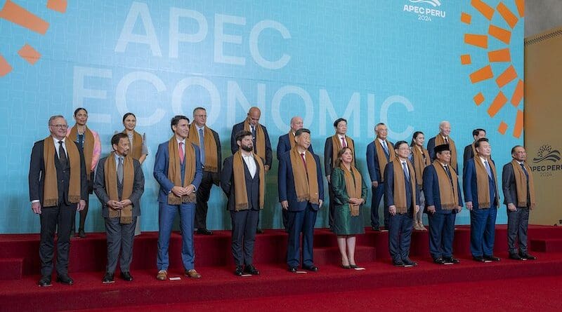 President Joe Biden participates in a family photo at the APEC Leaders’ Retreat, Saturday, November 16, 2024, at the Lima Convention Center in Lima, Peru. (Official White House Photo by Adam Schultz)