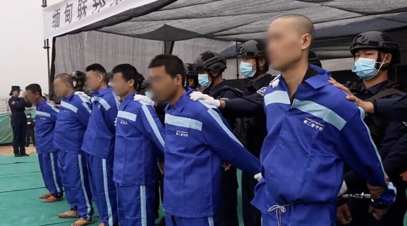 People sentenced by the Myanmar National Democratic Alliance Army are put on stage in front of a crowd in Laukkai town, northern Shan State, Dec. 5, 2024. (Image from Kokang Information Network video via Facebook)