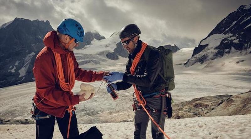 Mountaineers take samples from a glacier. CREDIT: Zoe Salt
