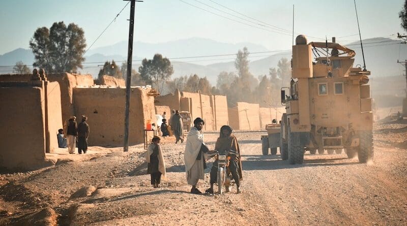 A Combat Logistics Battalion 4, 1st Marine Logistics Group (Forward), Mine Resistant Ambush Protected vehicle provides security during a combat logistics patrol through Helmand, Afghanistan. Photo Credit: Cpl. Mark Stroud, 1st Marine Logistics Group, DVIDS