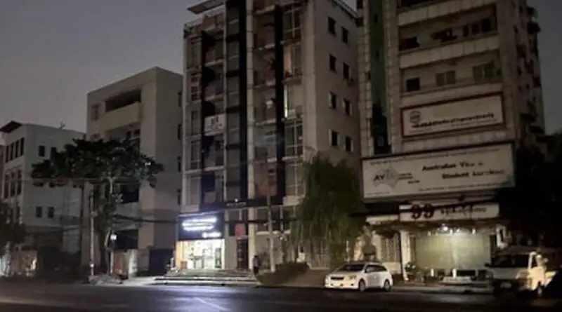 File photo of buildings in darkness on the main road in Yangon, Myanmar. Photo Credit: RFA