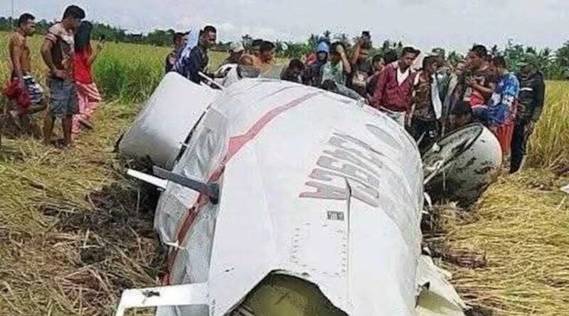People gather around the wreckage of a U.S. military-contracted plane that crashed in Maguindanao province, Philippines, Feb. 6, 2025. Photo Credit: Philippine National Police handout