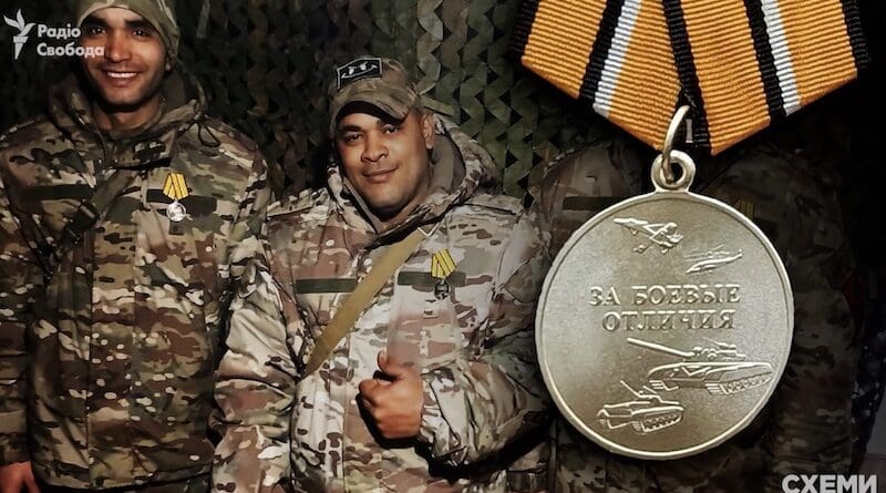 A Cuban mercenary wears a Russian combat medal. Photo Credit: Schemes (RFE/RL Graphic)