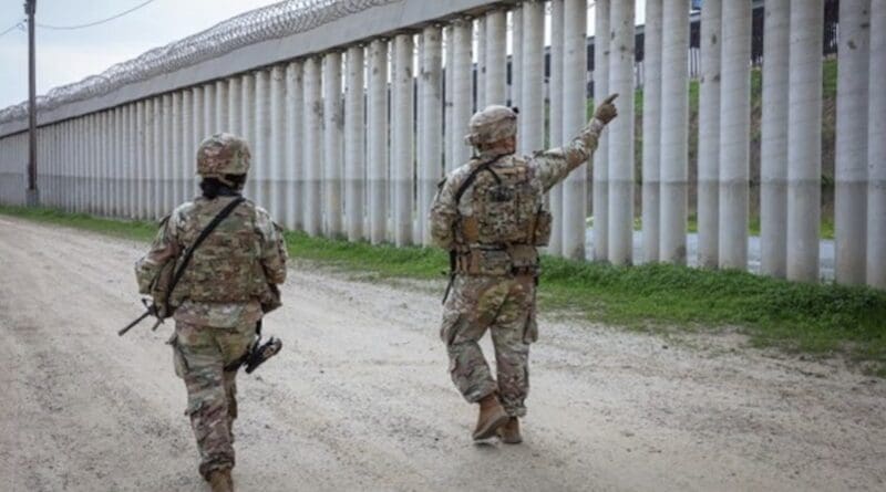 Army Sgt. Kyle Miller and Army Spc. Mohana Balakrishan, assigned to the 716th Military Police Company, 89th Military Police Brigade and assigned to Joint Task Force Southern Border, conduct a patrol along the southern border in San Diego, March 23, 2025. Photo Credit: Army Sgt. 1st Class Justin Geiger