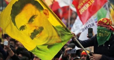 Supporters of Kurdistan Workers’ Party (PKK) with a banner of Abdullah Ocalan. Photo Credit: Mehr News Agency