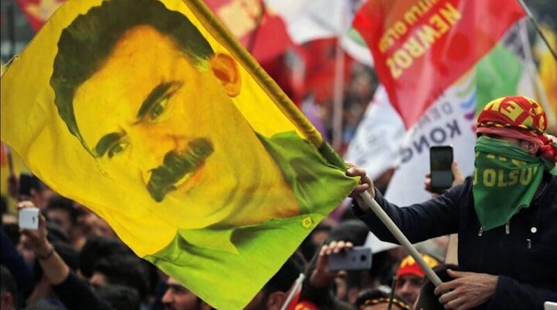 Supporters of Kurdistan Workers’ Party (PKK) with a banner of Abdullah Ocalan. Photo Credit: Mehr News Agency